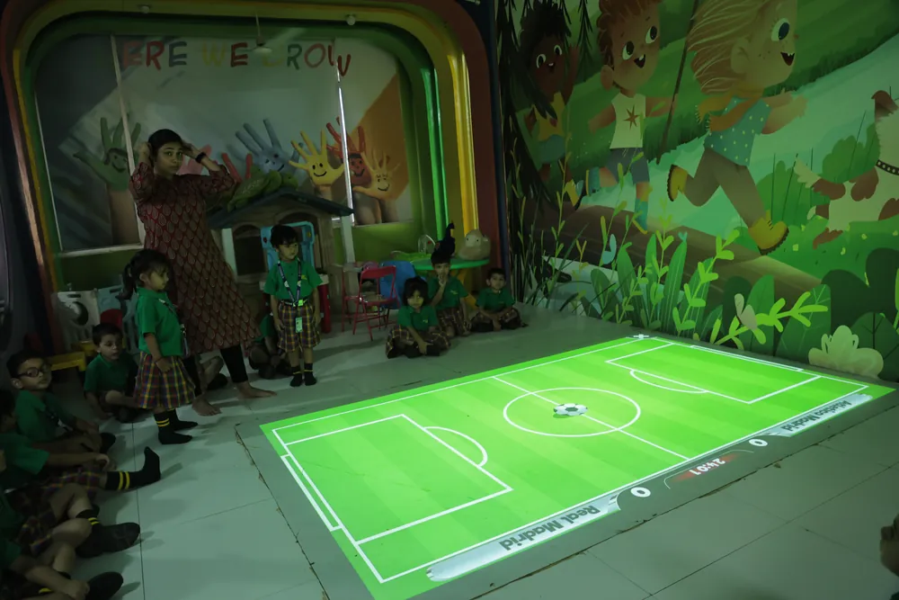 Children on the interactive Step & Learn floor