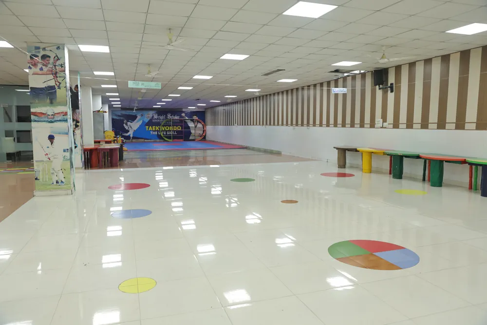 The Eureka Hall floor, marked out with coloured circles for games