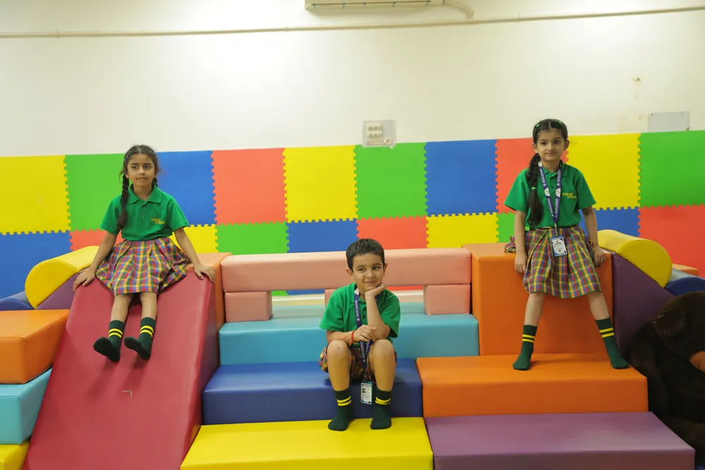Children on the soft-play steps and slide