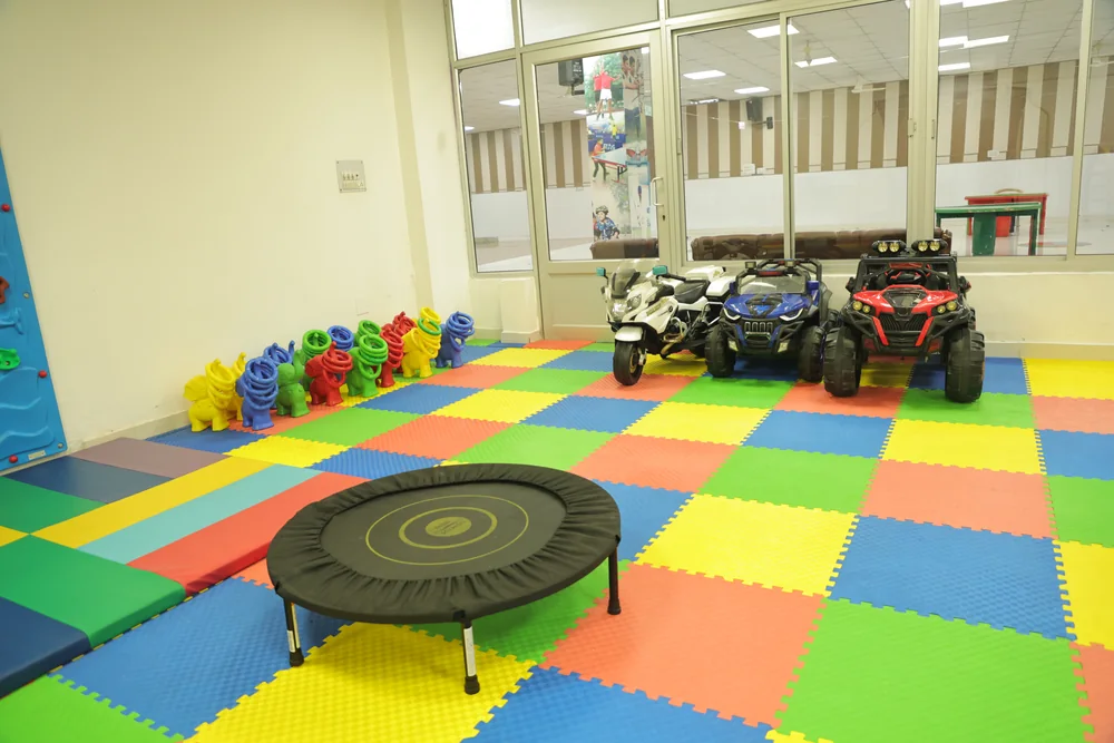 Ride-on cars and the soft-play floor of Wonderland