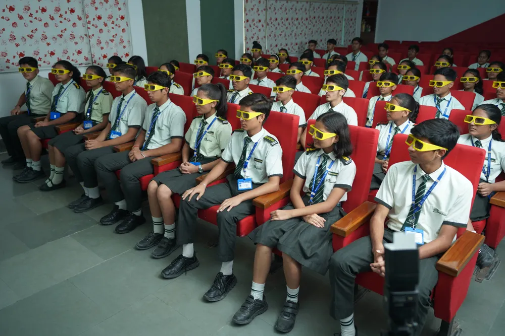 Students seated in the 3D lab wearing 3D glasses