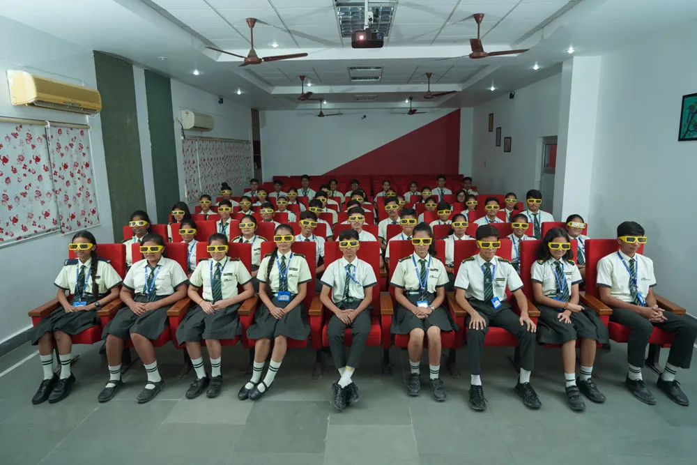 The 3D lab auditorium with rows of red seats