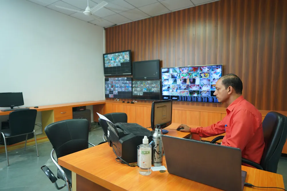 Staff monitoring CCTV screens