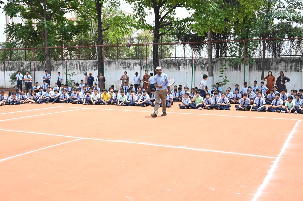 Students gathered on the sports court