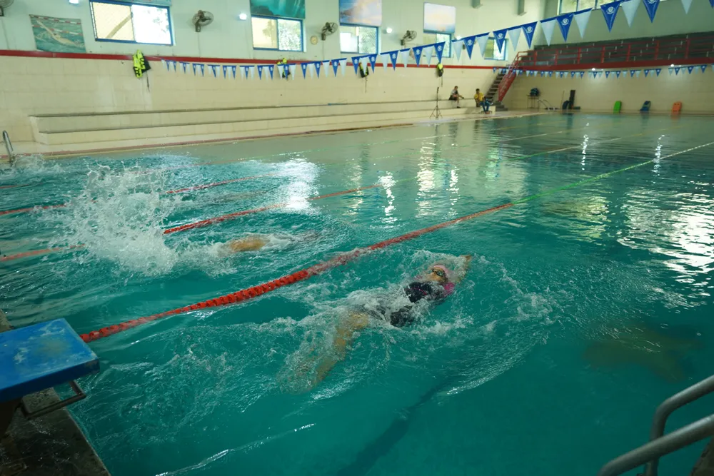 A swimmer in the indoor swimming pool