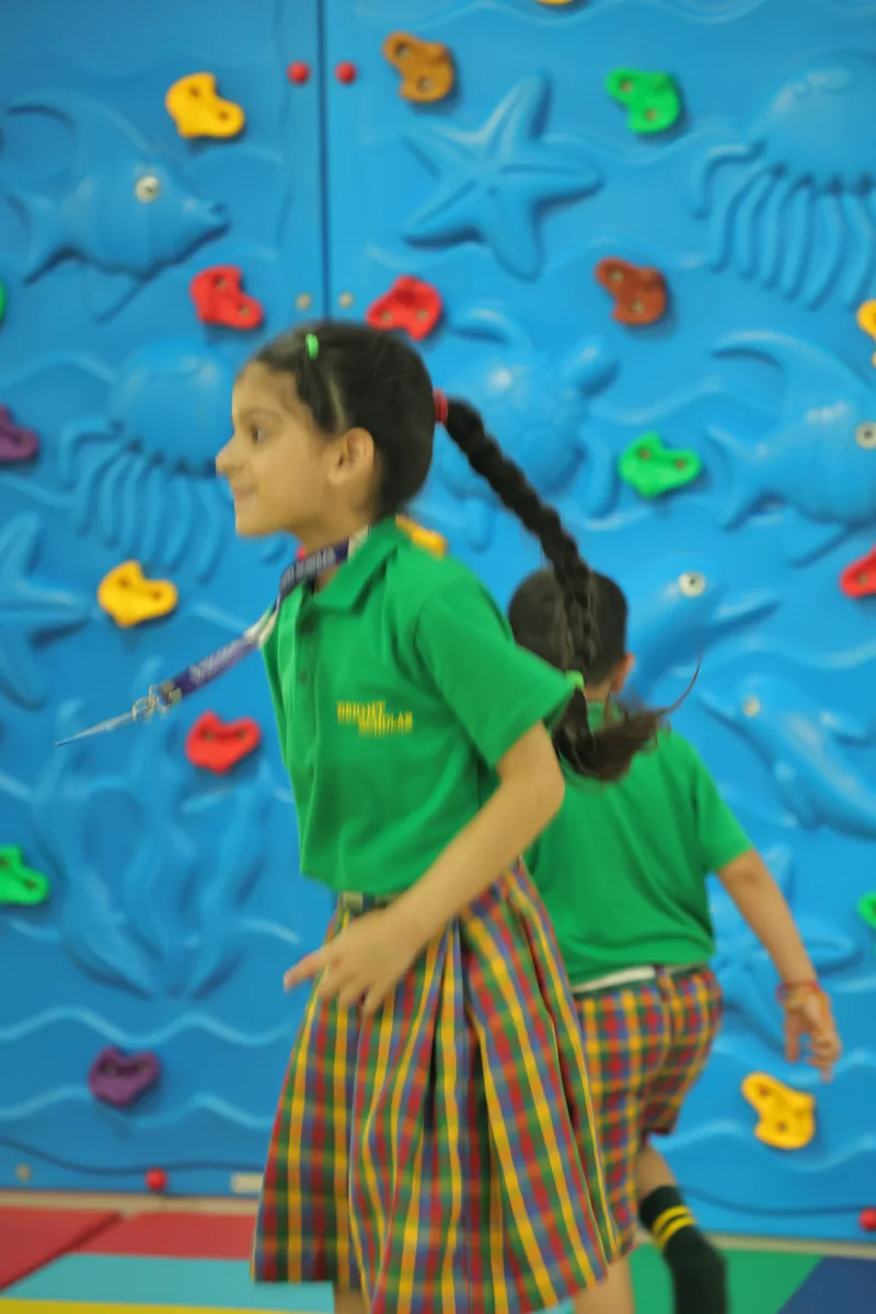 Two children on the climbing wall in Wonderland