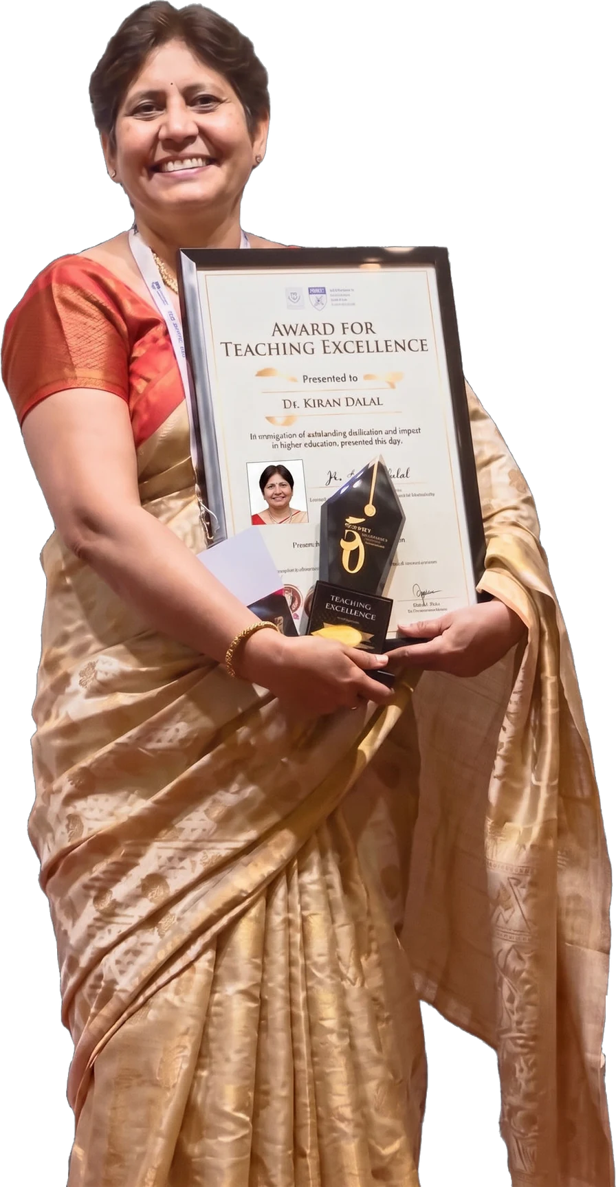 Dr Kiran Dalal, Principal, holding the Award for Teaching Excellence and its trophy