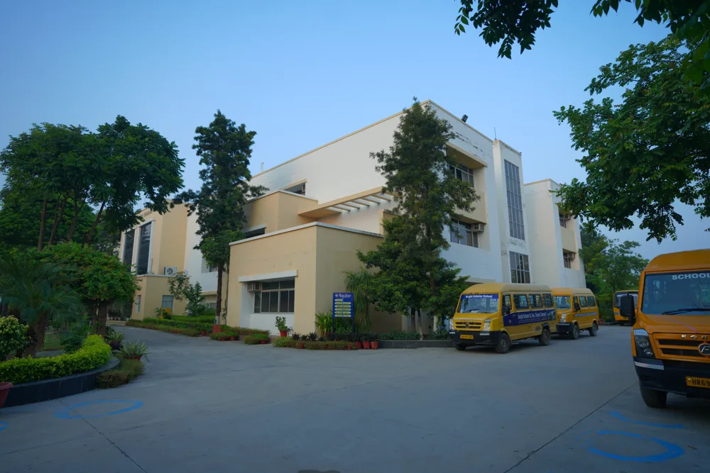 The school’s own fleet of buses lined up on the campus